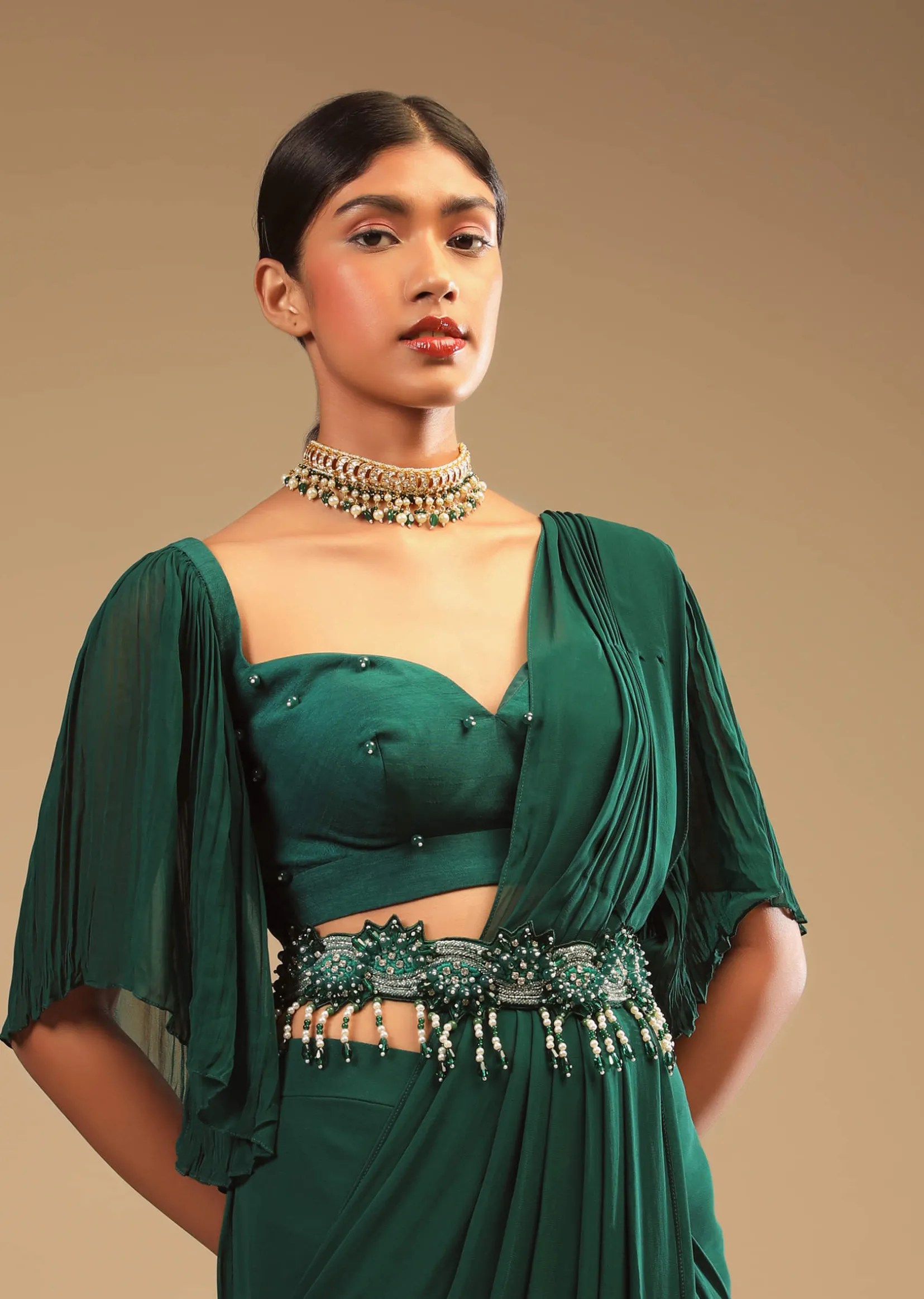 Emerald Green Ready To Wear Saree In Georgette With Bell Sleeves Crop Top And Chunky Embroidered Belt