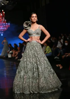 Fern Green Lehenga Choli In Net With Stone Hand Embroidered Floral Motifs And Fancy Origami Cones On The Shoulder