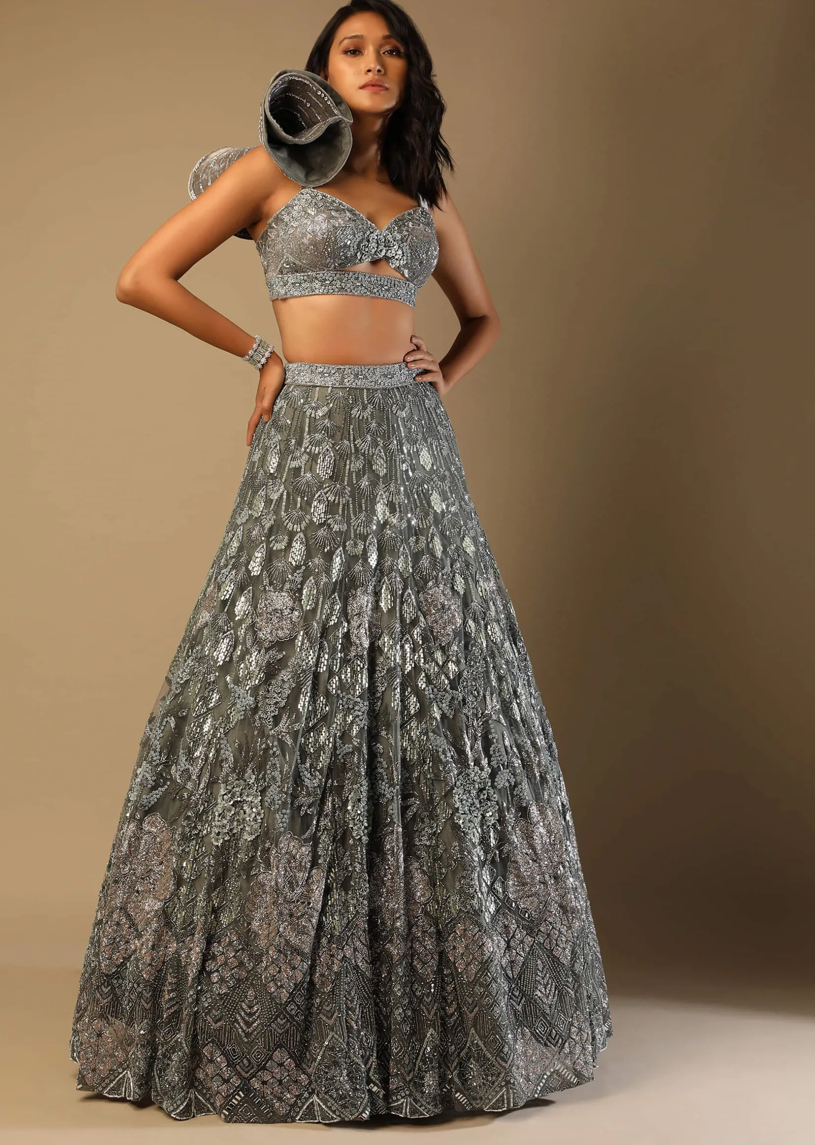 Fern Green Lehenga Choli In Net With Stone Hand Embroidered Floral Motifs And Fancy Origami Cones On The Shoulder