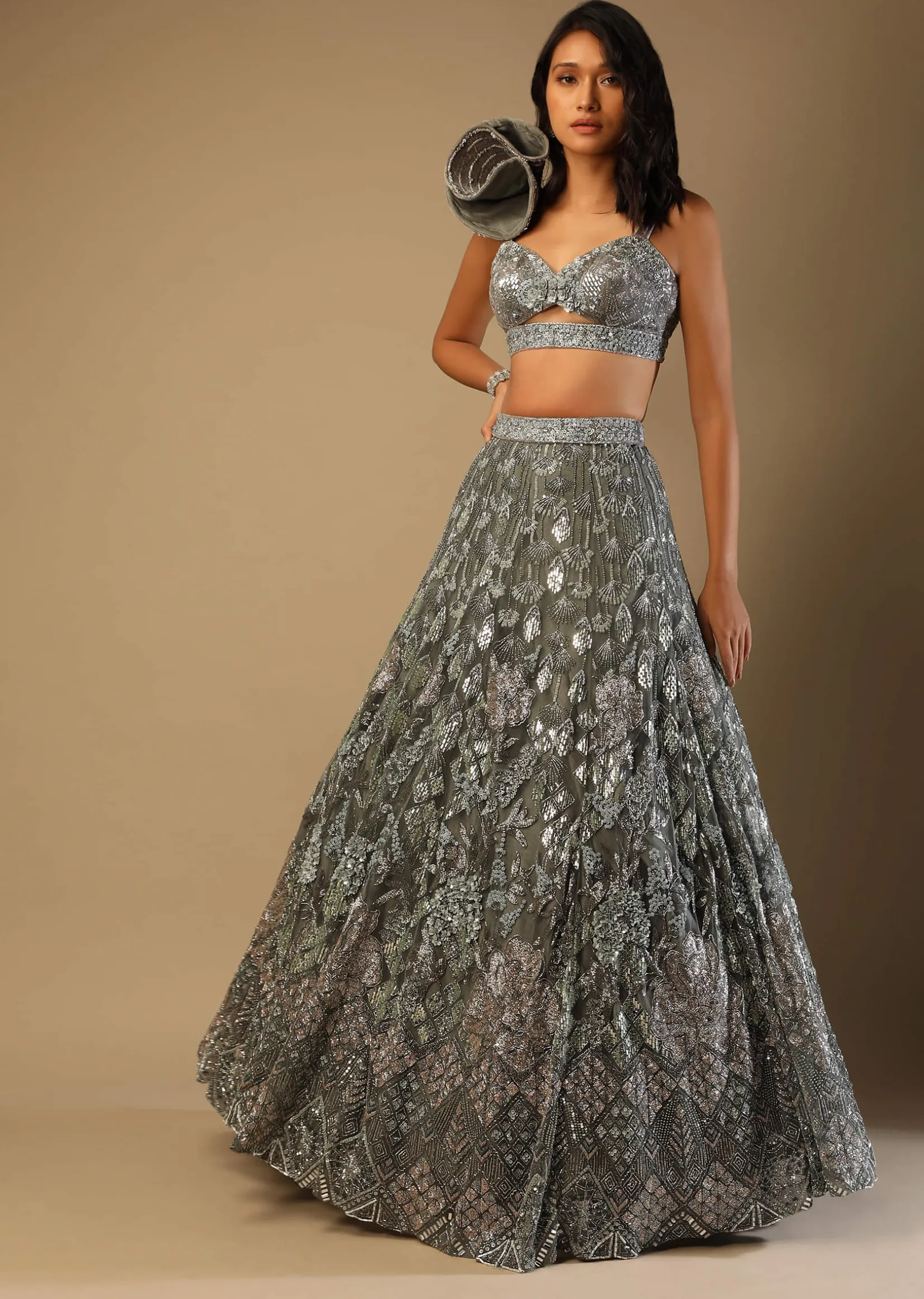 Fern Green Lehenga Choli In Net With Stone Hand Embroidered Floral Motifs And Fancy Origami Cones On The Shoulder