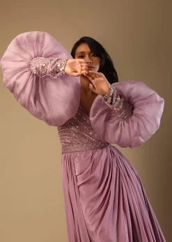 Frozen Mauve Gown With Hand Embroidered Bodice, Balloon Sleeves And A Long Trail