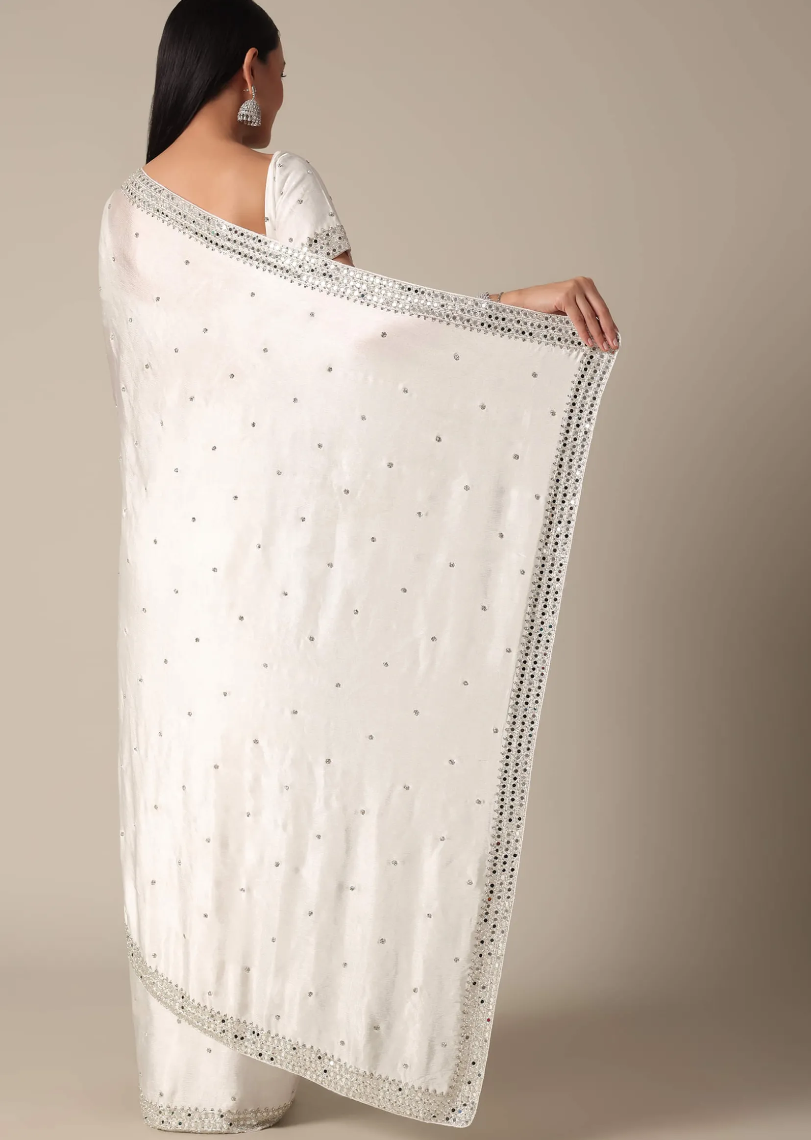 Glamorous White Chinnon Saree With Stone Embellishments