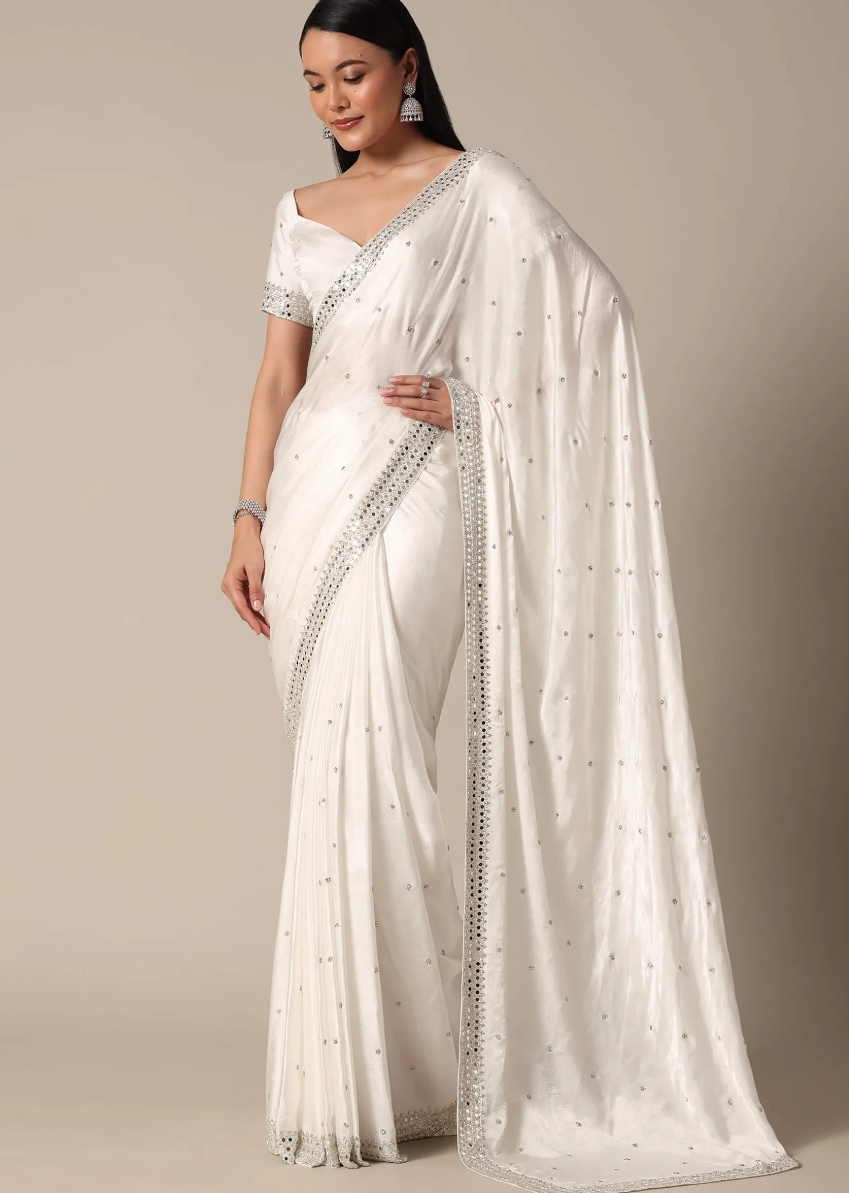 Glamorous White Chinnon Saree With Stone Embellishments