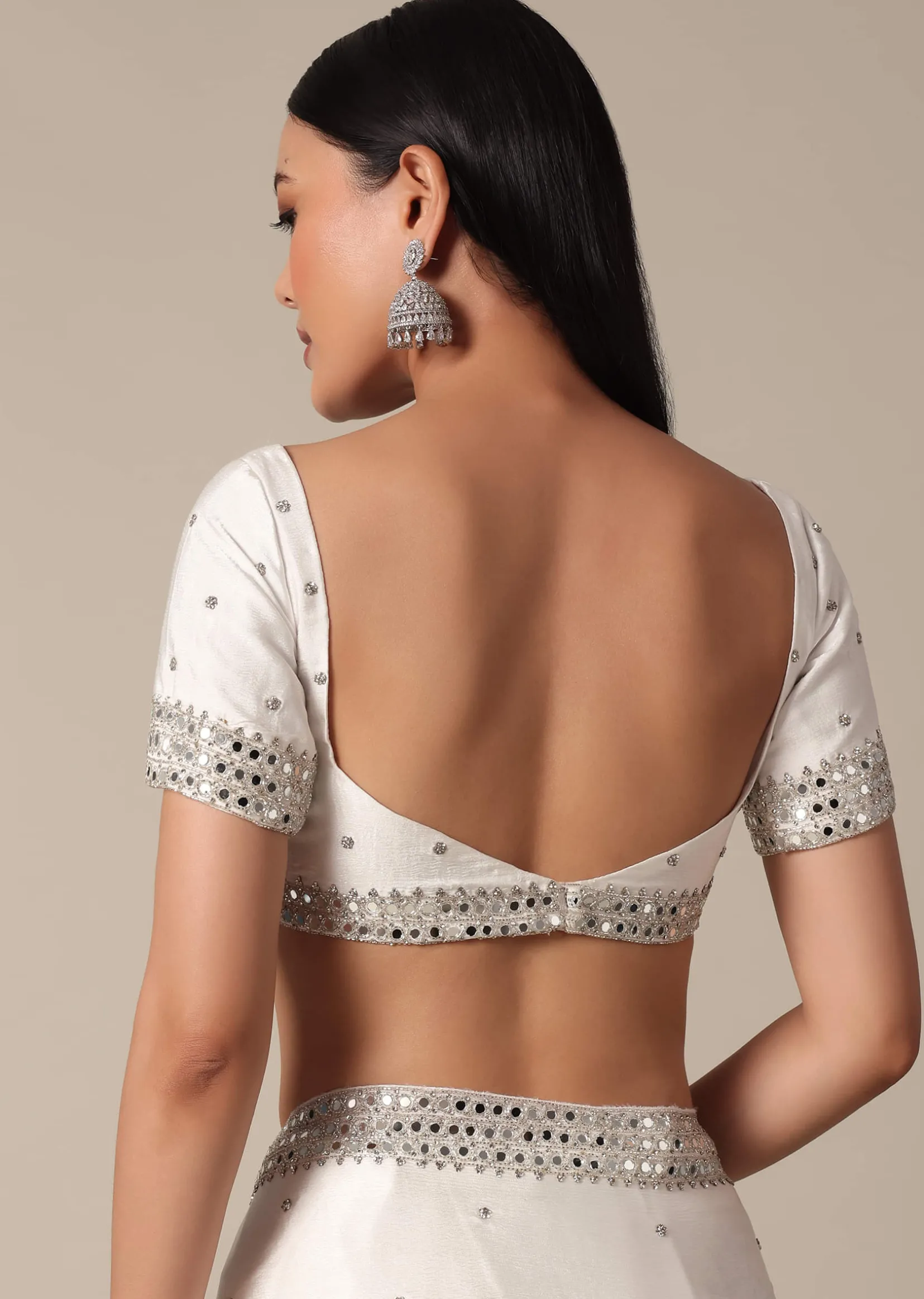 Glamorous White Chinnon Saree With Stone Embellishments