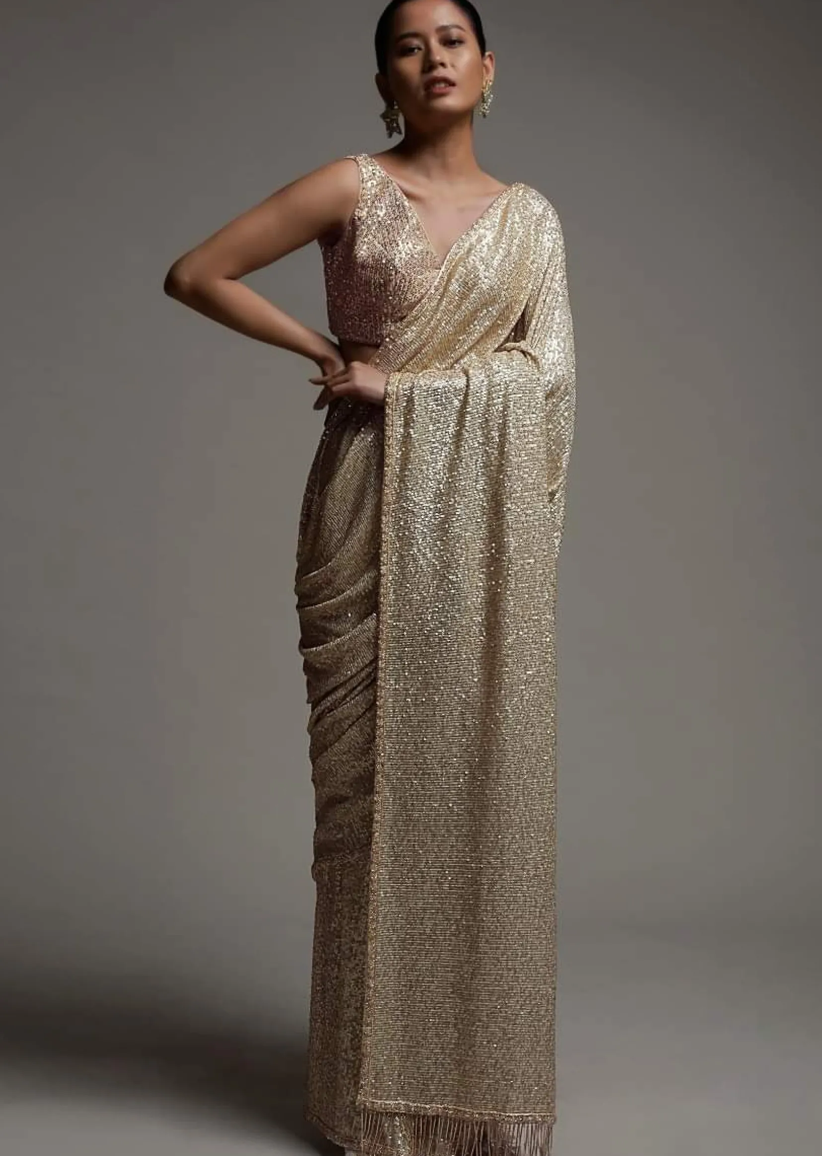 Gold Beige Saree Embellished In Sequins With Fringes On The Pallu And Unstitched Blouse