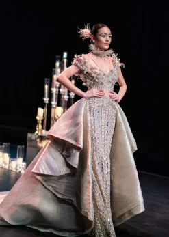 Gold Draped Gown With Trail Detail And Heavy Embroidery