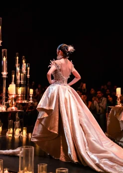 Gold Draped Gown With Trail Detail And Heavy Embroidery