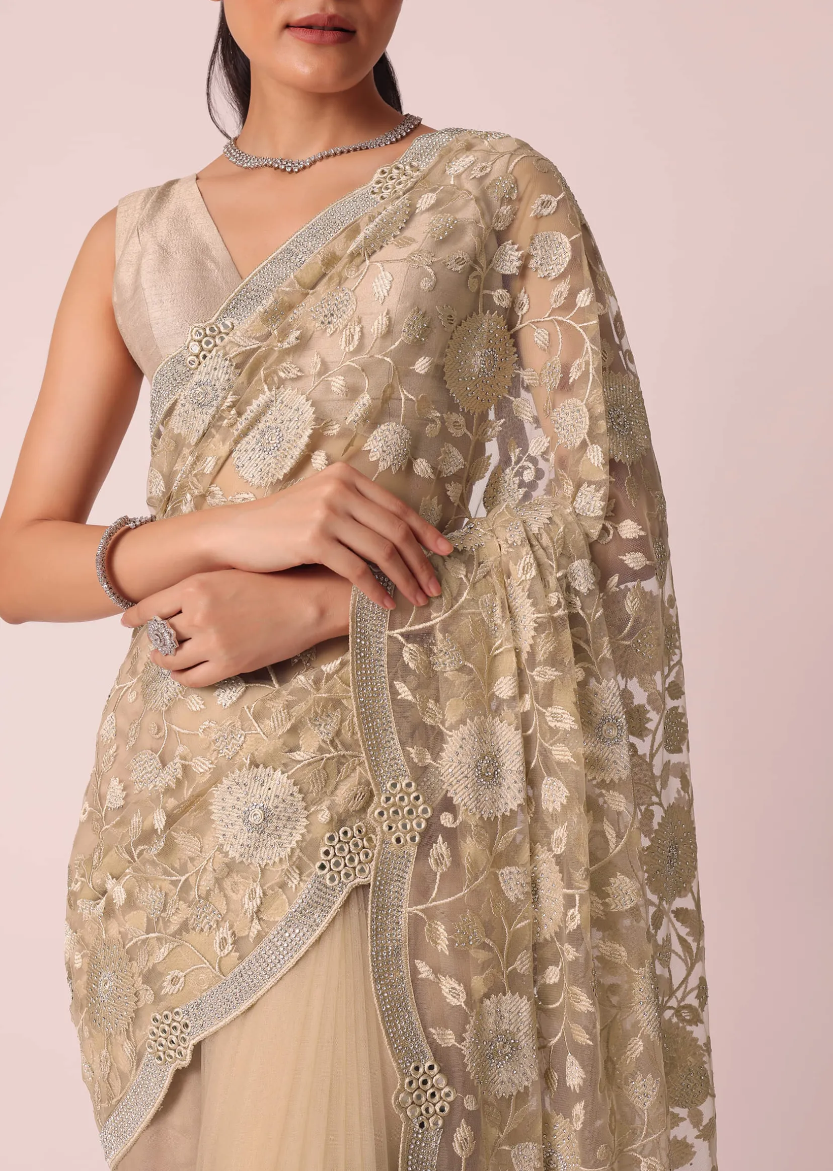 Gold Net Saree With Stone Studded And Floral work And Unstitched Blouse Piece