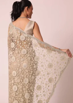 Gold Net Saree With Stone Studded And Floral work And Unstitched Blouse Piece