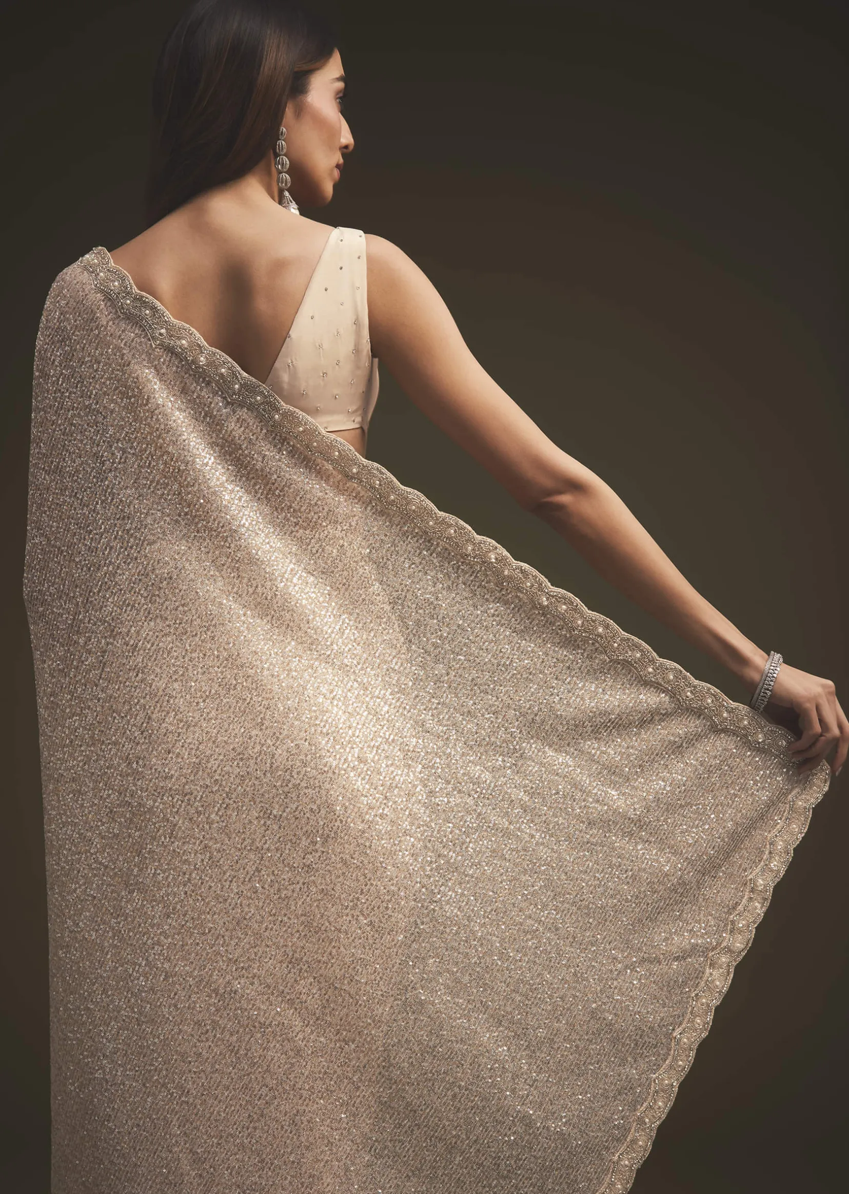 Gold Sequins Saree With An Embellished Border