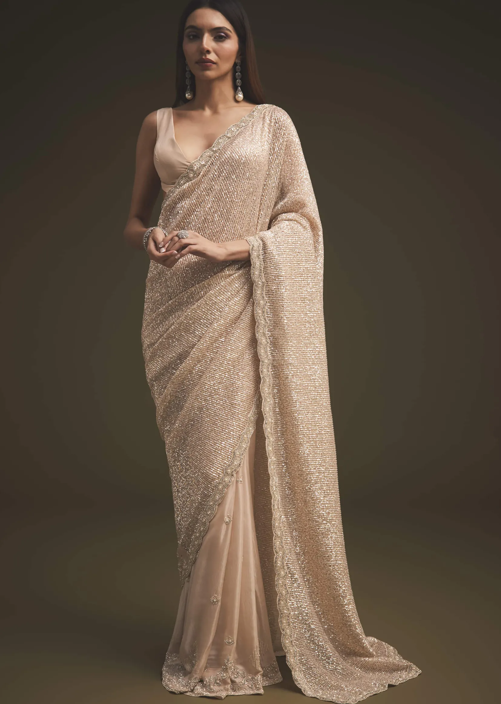 Gold Sequins Saree With An Embellished Border