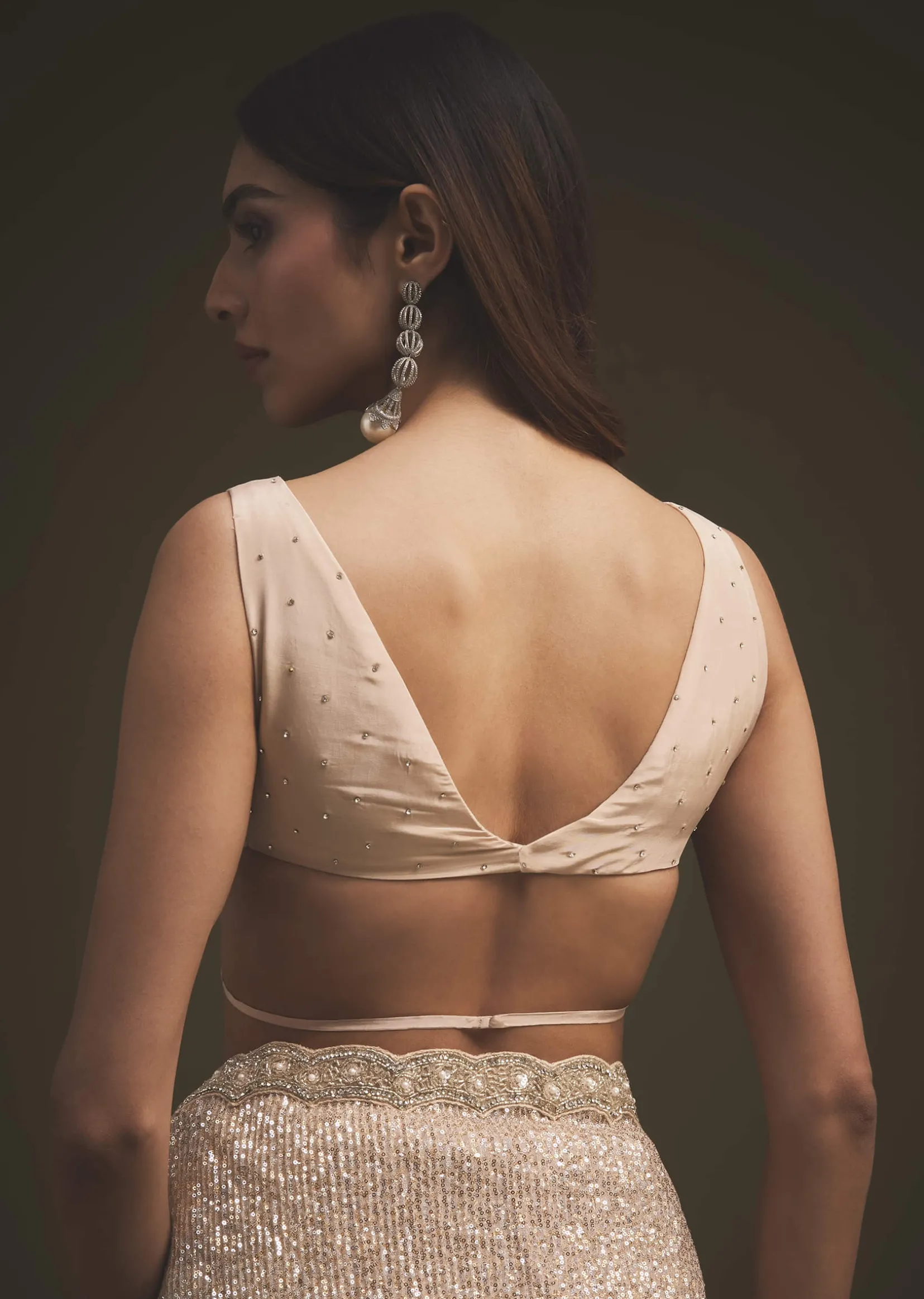 Gold Sequins Saree With An Embellished Border
