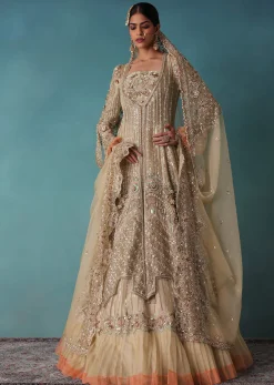 Gold Toned Embroidered Bridal Lehenga And Heavy Tube Top With Jacket