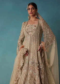 Gold Toned Embroidered Bridal Lehenga And Heavy Tube Top With Jacket