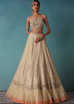 Gold Toned Embroidered Bridal Lehenga And Heavy Tube Top With Jacket