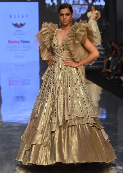 Gold Toned Kalki Gown With Ruffle Sleeves And Embroidery - NOOR 2022