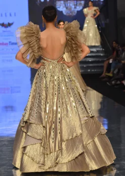 Gold Toned Kalki Gown With Ruffle Sleeves And Embroidery - NOOR 2022