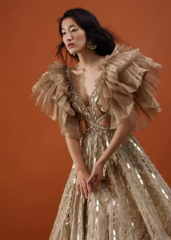 Gold Toned Kalki Gown With Ruffle Sleeves And Embroidery - NOOR 2022