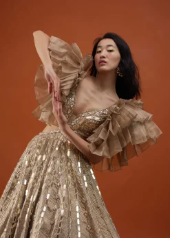 Gold Toned Kalki Gown With Ruffle Sleeves And Embroidery - NOOR 2022
