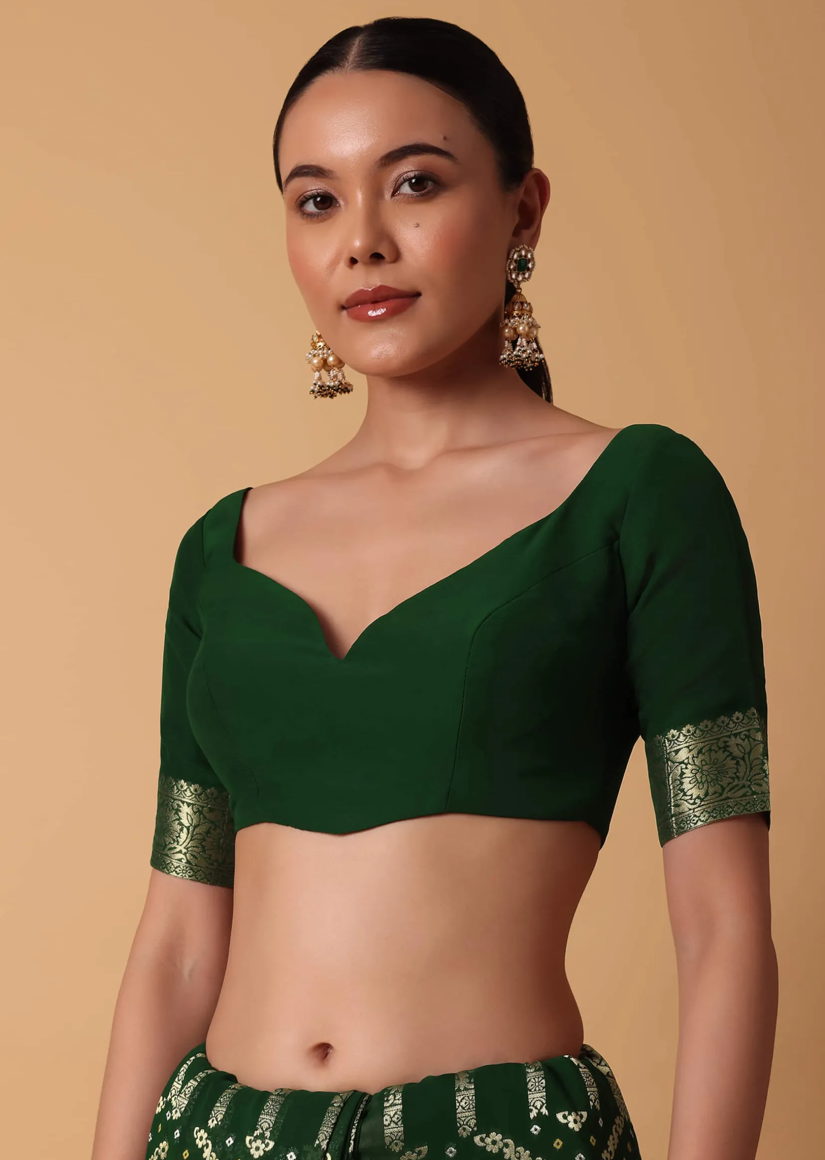 Green Banarasi Georgette Saree With Zari Bandhani Weave And Unstitched Blouse Piece