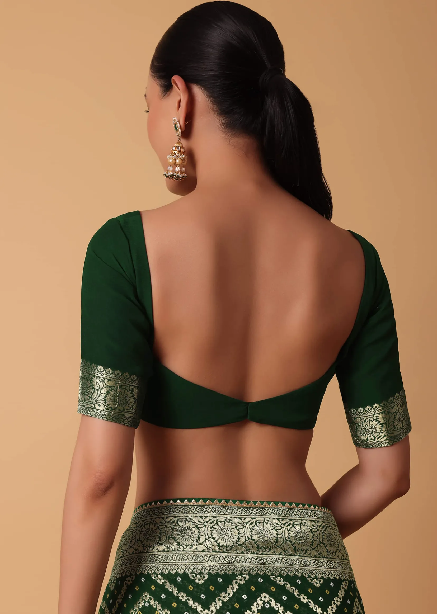 Green Banarasi Georgette Saree With Zari Bandhani Weave And Unstitched Blouse Piece