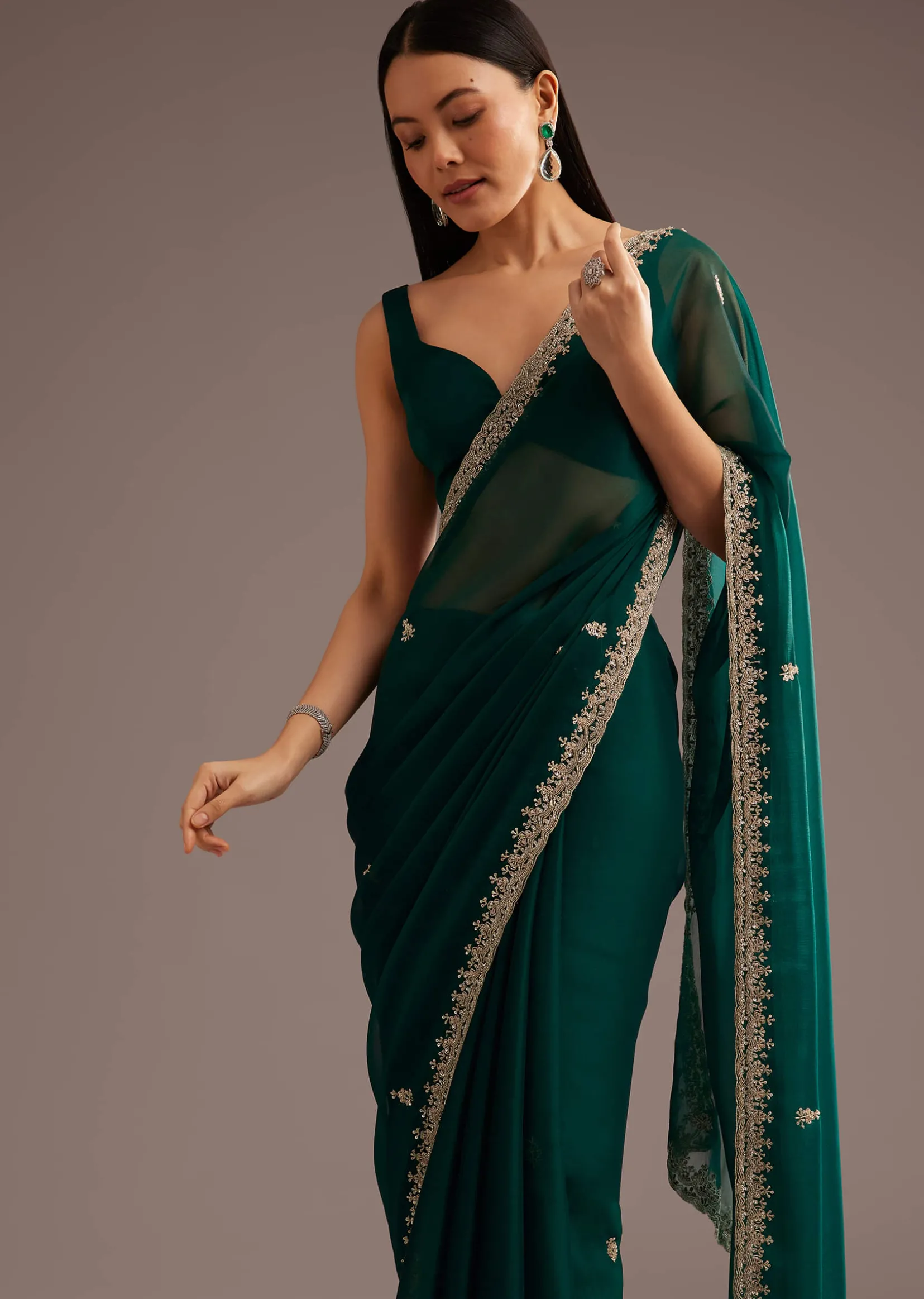 Green Organza Saree With Cutdana And Sequins Border
