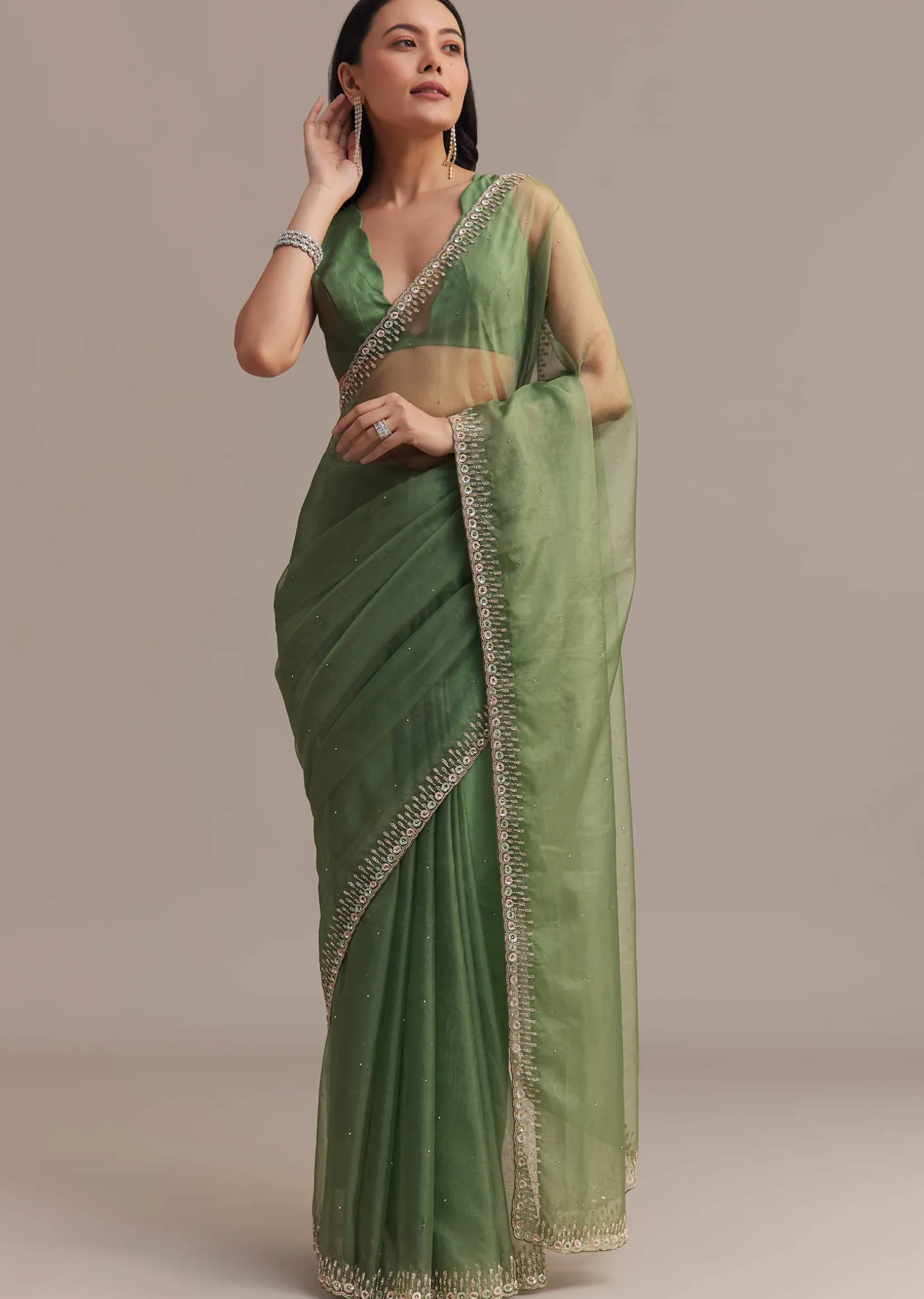 Green Organza Saree With Sequins And Cutdana Embellished Border