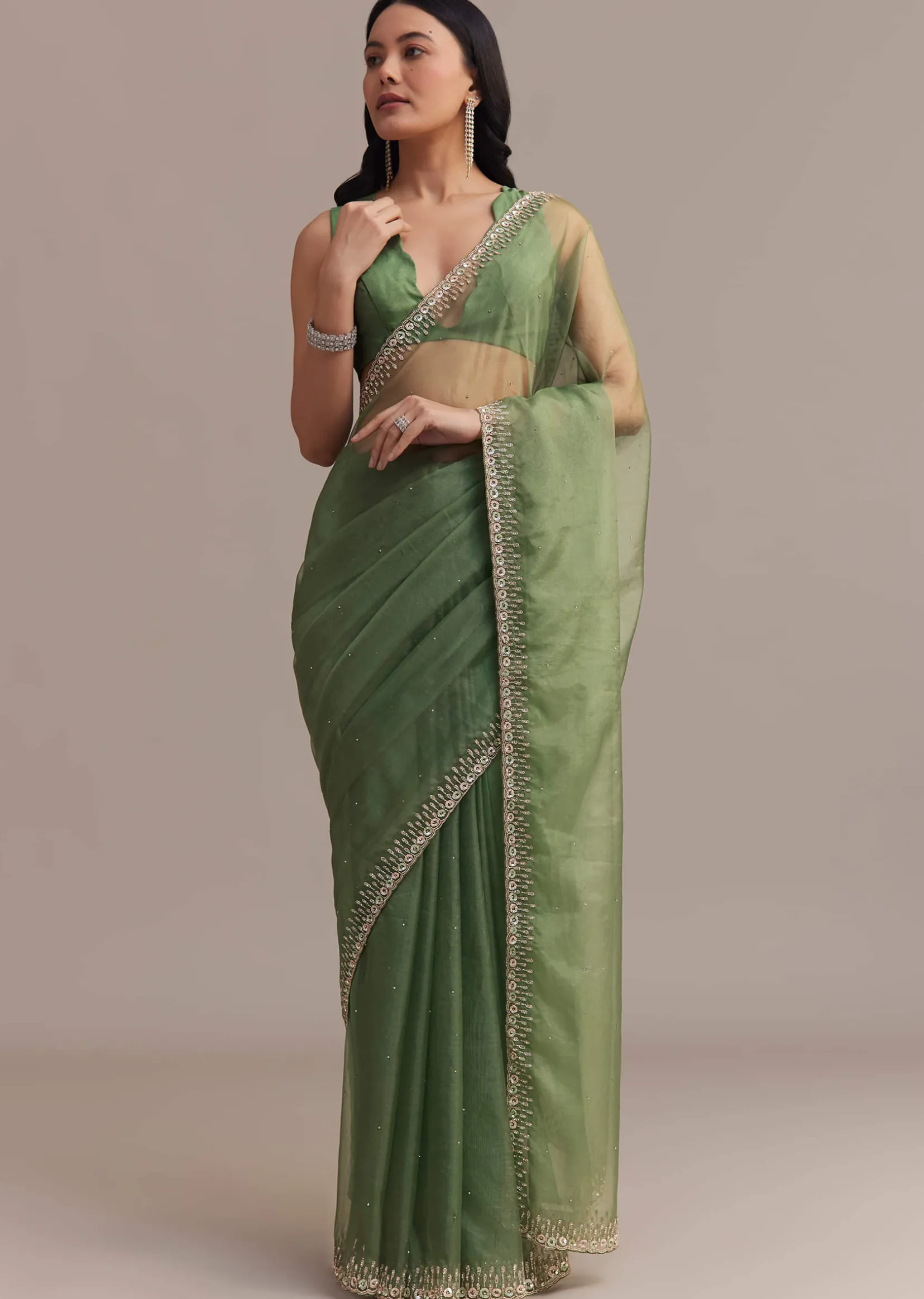 Green Organza Saree With Sequins And Cutdana Embellished Border
