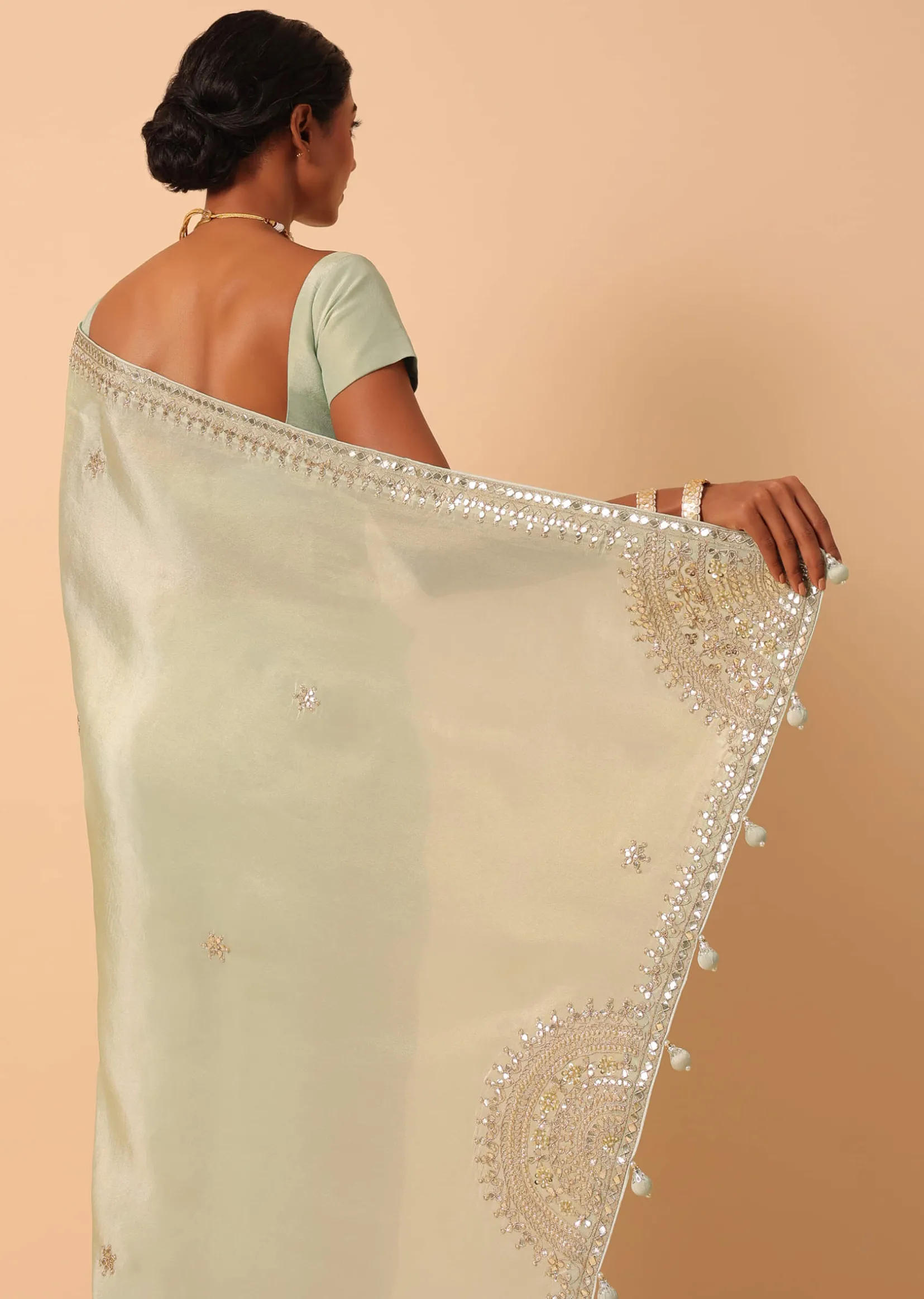 Green Tissue Silk Saree With Gota Patti Work And Unstitched Blouse Piece