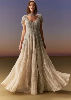 Grey Gown With Draped Cap Sleeves And Flowing Embroidered Flare