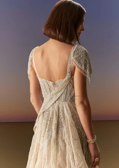 Grey Gown With Draped Cap Sleeves And Flowing Embroidered Flare