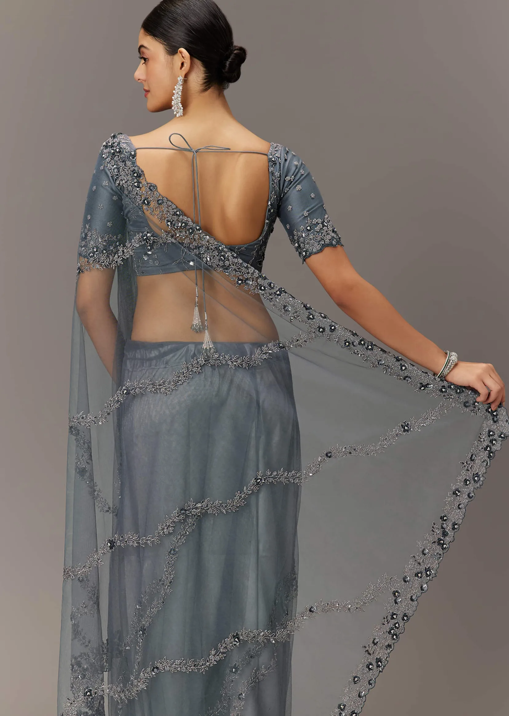 Grey Net Saree With All Over Heavy Embroidery And Net Blouse