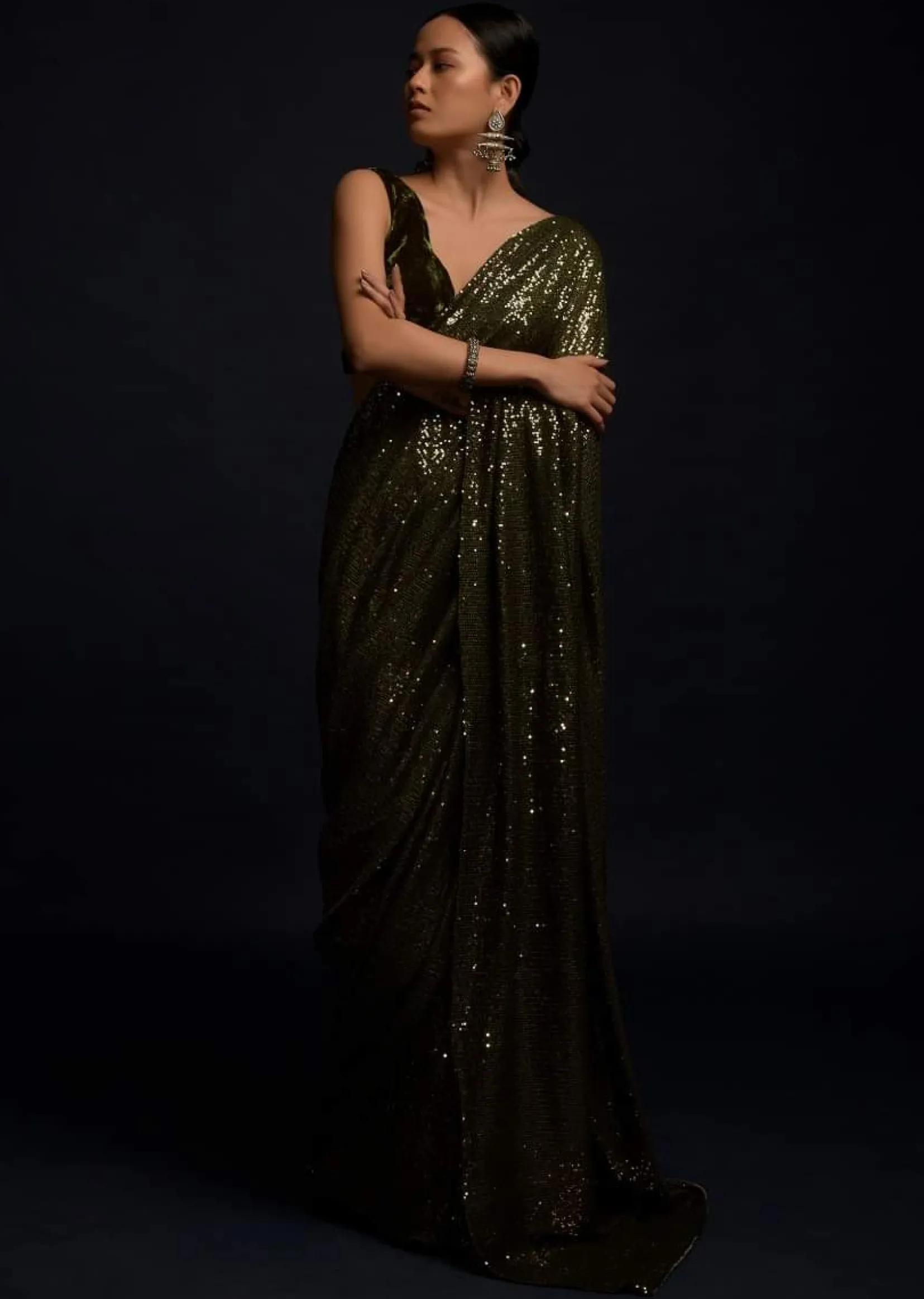 Henna Green Ready Pleated Saree Embellished In Sequins With A Matching Velvet Blouse With Plunging Neckline