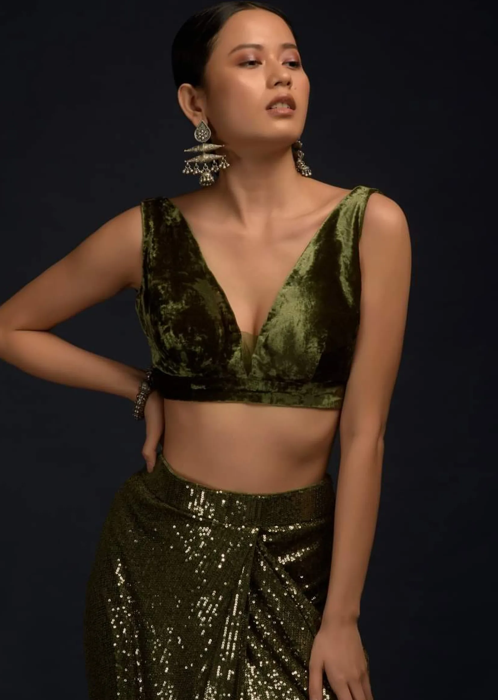 Henna Green Ready Pleated Saree Embellished In Sequins With A Matching Velvet Blouse With Plunging Neckline