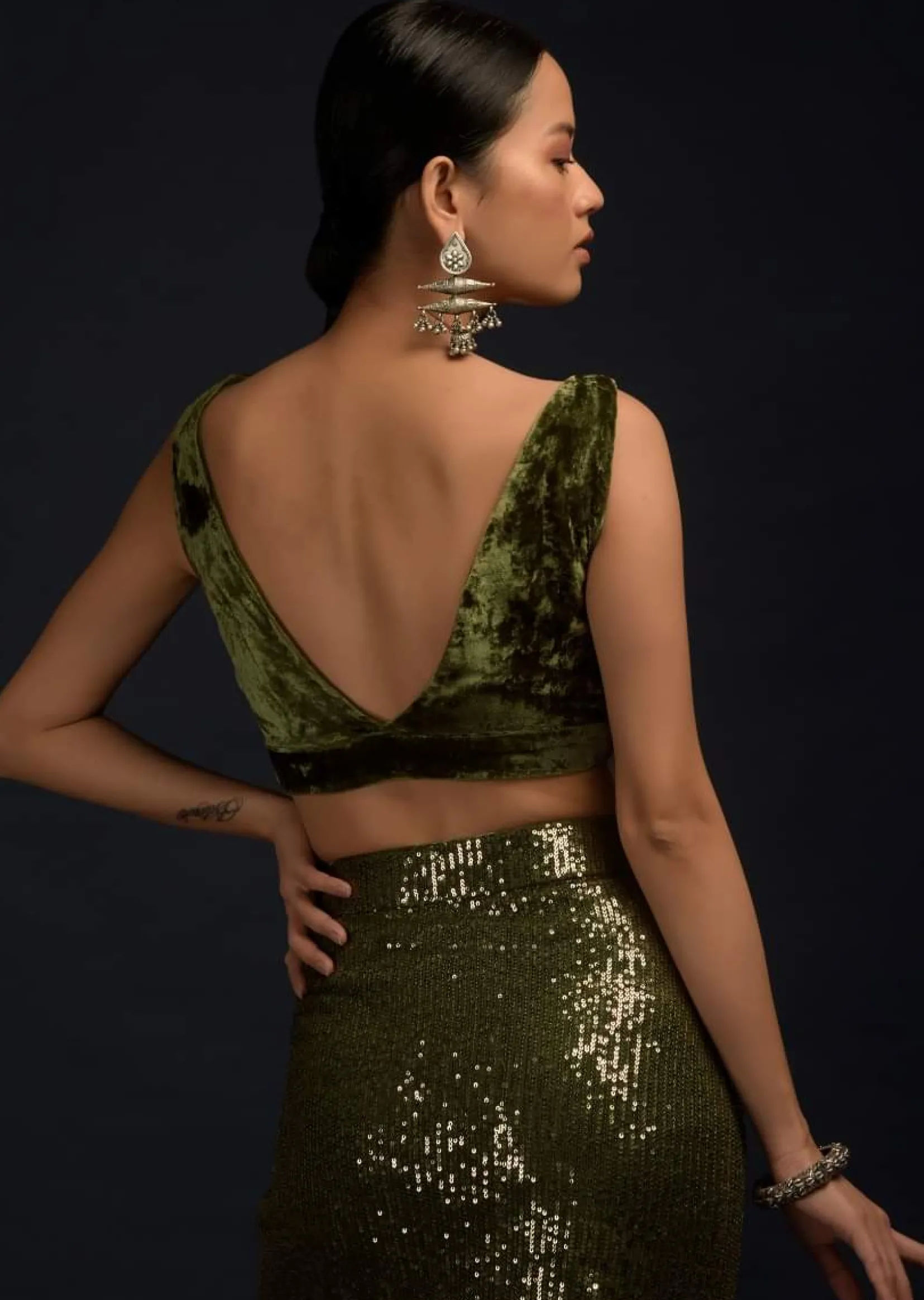 Henna Green Ready Pleated Saree Embellished In Sequins With A Matching Velvet Blouse With Plunging Neckline