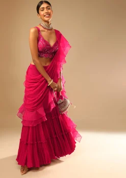 Hot Pink Crop Top Sharara Suit With An Attached Ruffle Draped And An Hand Embroidered Leaf Motifs