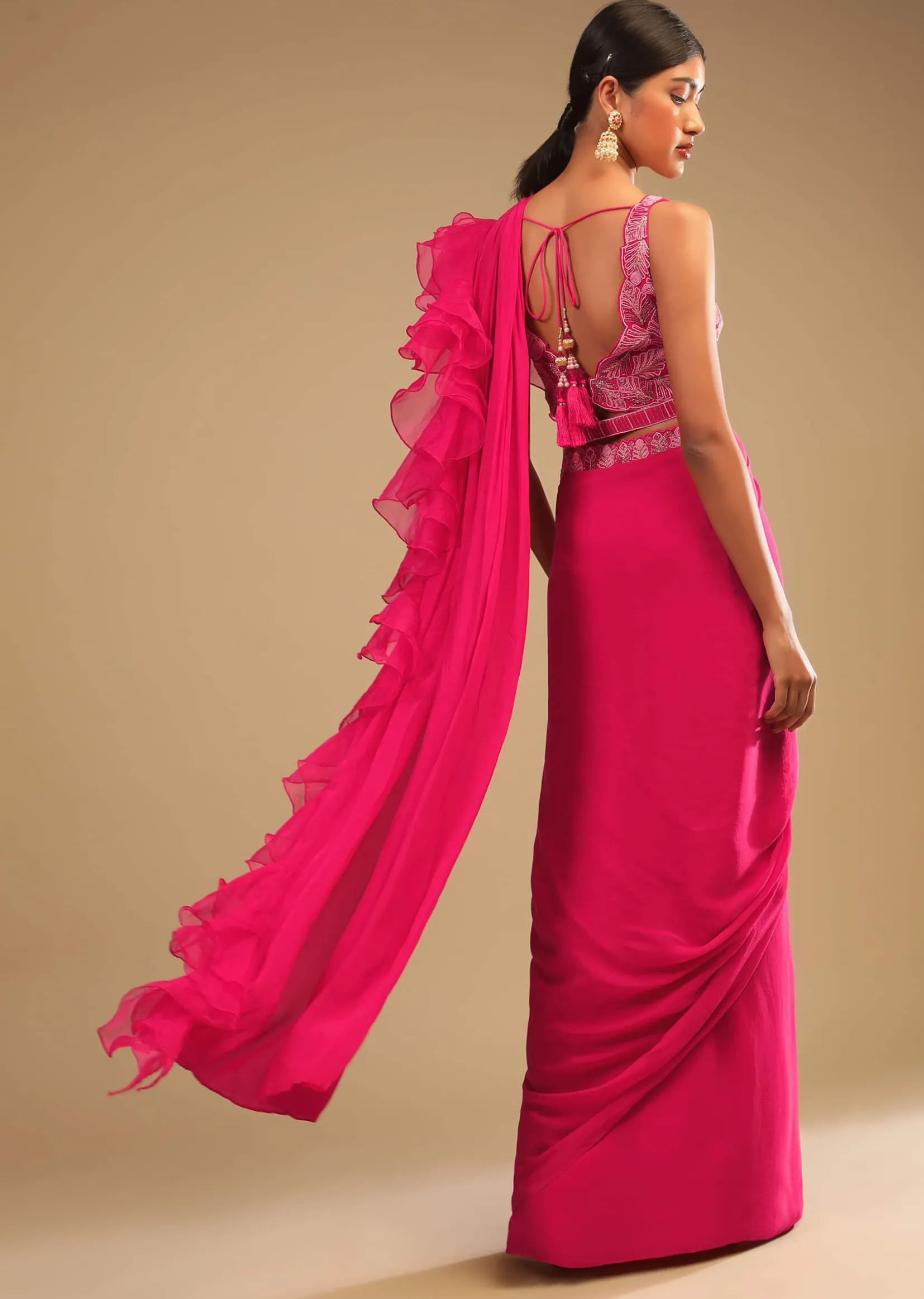 Hot Pink Readymade Saree In Crepe With Ruffle Frill On The Pallu And Beads Embroidered Crop Top And Belt
