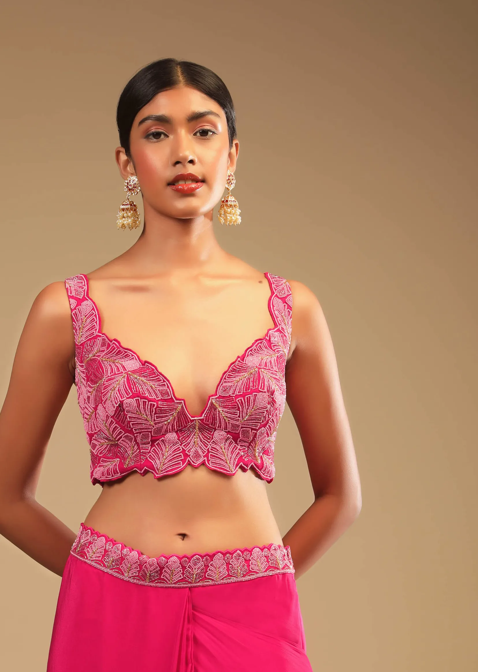 Hot Pink Readymade Saree In Crepe With Ruffle Frill On The Pallu And Beads Embroidered Crop Top And Belt