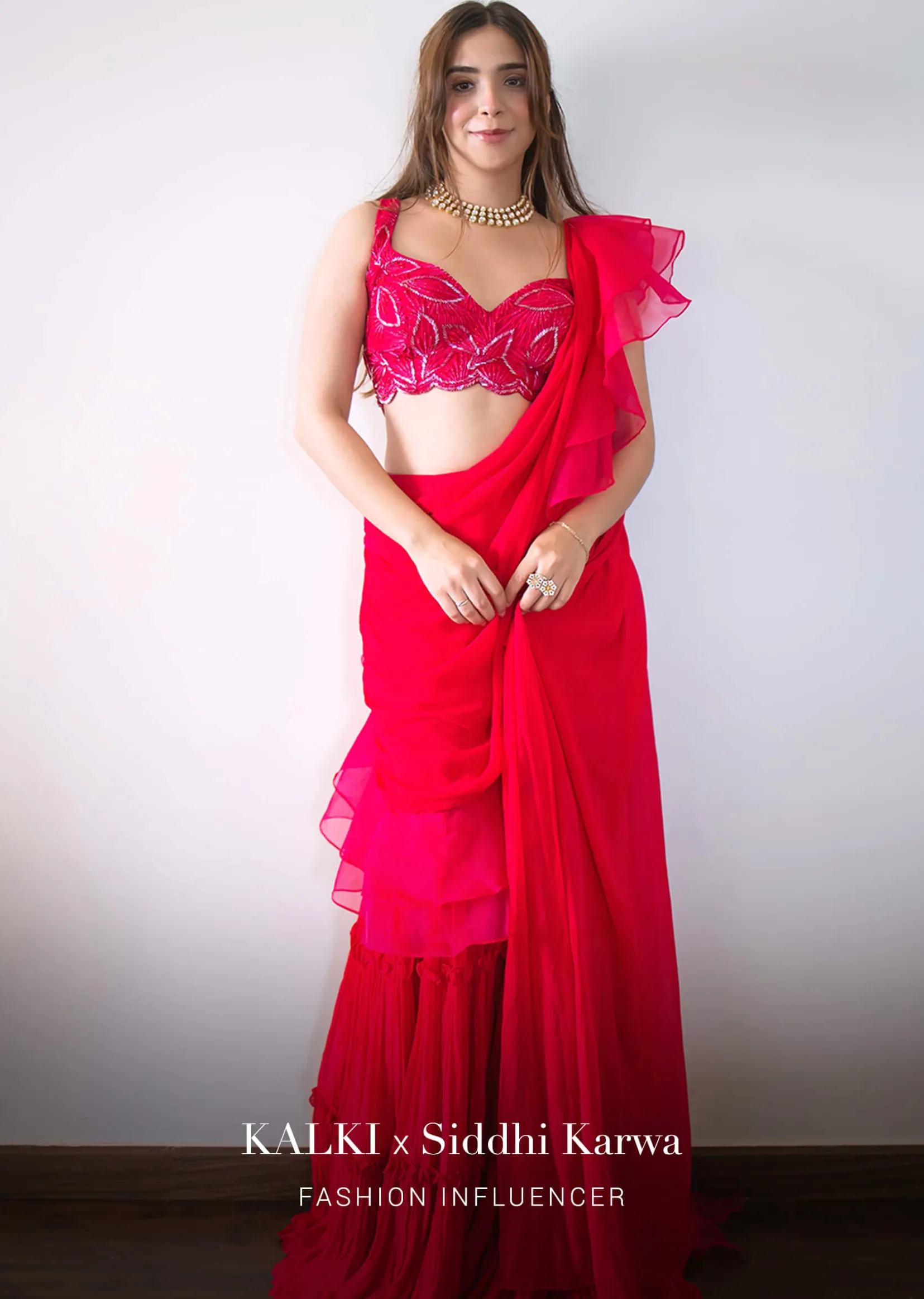 Hot Pink Readymade Saree In Crepe With Ruffle Frill On The Pallu And Beads Embroidered Crop Top And Belt