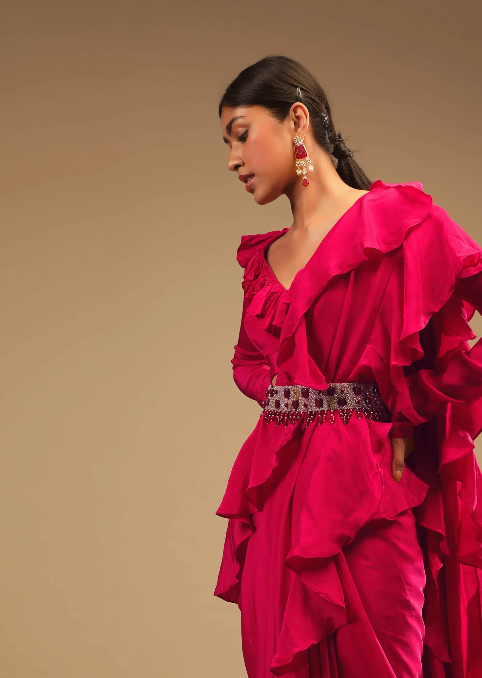 Hot Pink Saree With Ruffle Pallu, Stone Embellished Belt And A Ruffle Blouse With Side Cut Outs