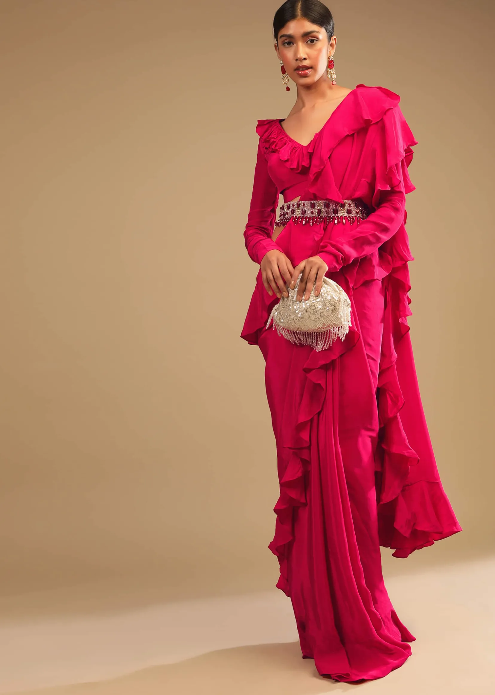 Hot Pink Saree With Ruffle Pallu, Stone Embellished Belt And A Ruffle Blouse With Side Cut Outs