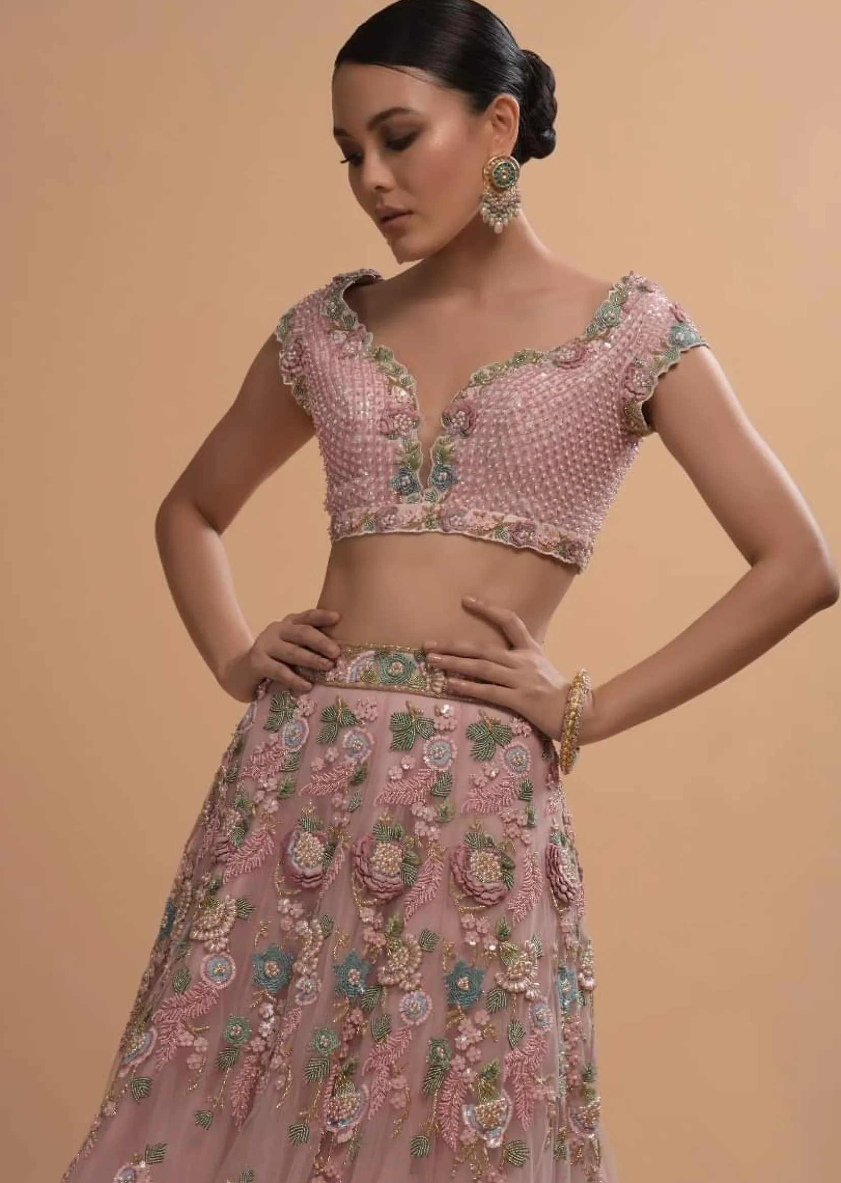 Icy Pink Net Lehenga And Cap Sleeves Crop Top With 3D Flower Cluster And Scattered Buttis