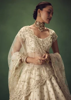 Ivory Lehenga Set With Hand Embroidered Thread And Zari Work