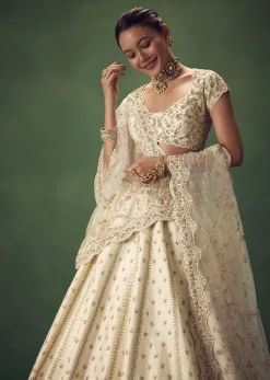 Ivory Lehenga Set With Hand Embroidered Thread And Zari Work