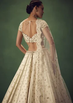 Ivory Lehenga Set With Hand Embroidered Thread And Zari Work
