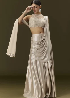 Ivory Lycra Draped Saree With Embroidered Blouse
