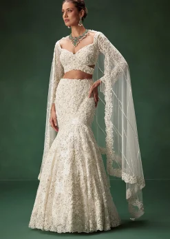 Ivory Mermaid Bridal Lehenga With Full Sleeves And Heavy Embroidery