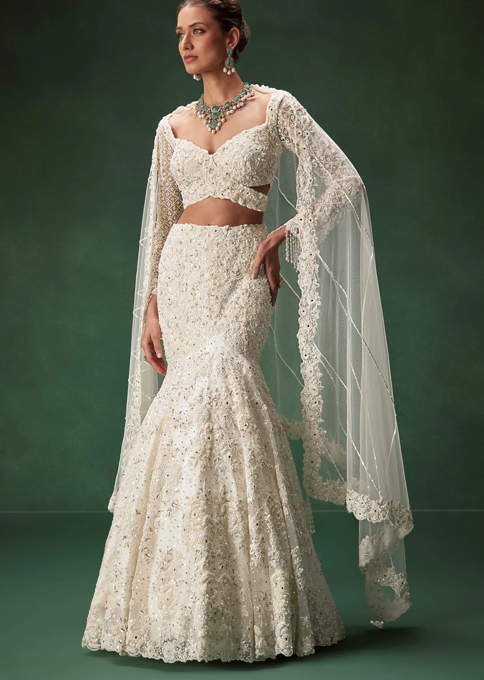 Ivory Mermaid Bridal Lehenga With Full Sleeves And Heavy Embroidery