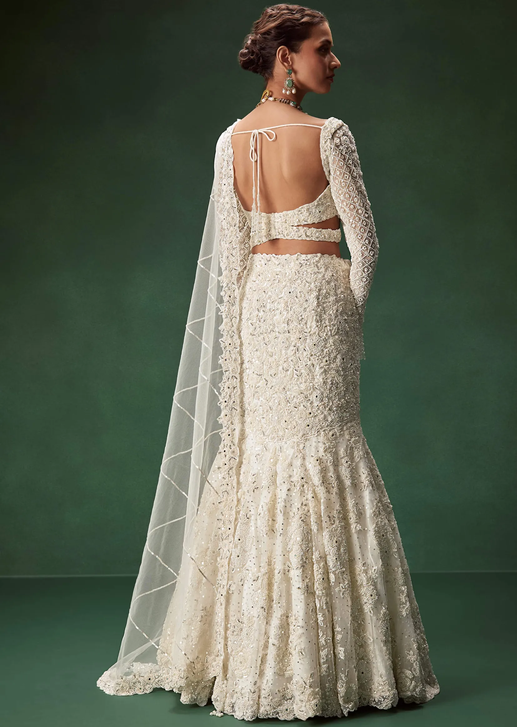 Ivory Mermaid Bridal Lehenga With Full Sleeves And Heavy Embroidery
