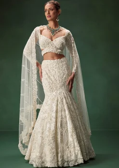 Ivory Mermaid Bridal Lehenga With Full Sleeves And Heavy Embroidery